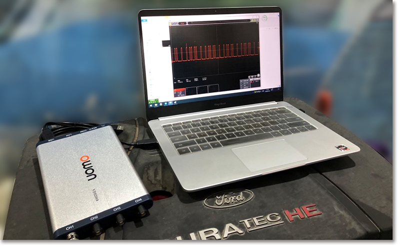 OWON oscilloscope used for automotive crankshaft sensor testing